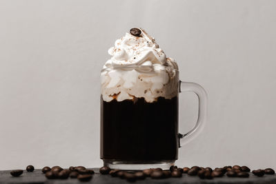 Close-up of coffee cup on table