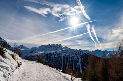 Panoramic view of snowcapped mountains against sky