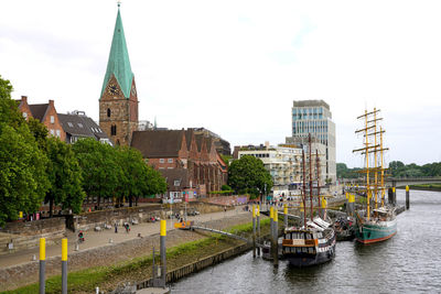 Bremen cityscape with the river weser and st. martin tower church on the background