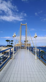 View of bridge against cloudy sky