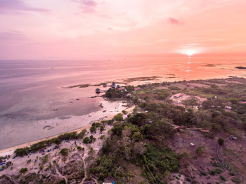 Scenic view of sea against sky at sunset