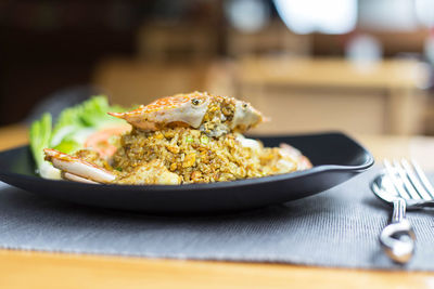 Close-up of food in plate on table