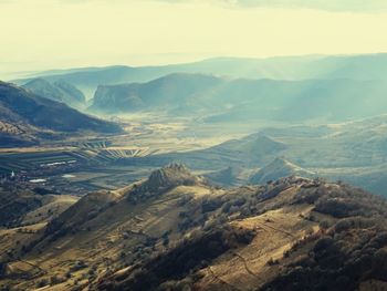 Aerial view of mountains against sky
