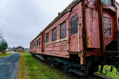 Train on railroad track against sky