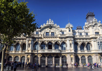 Group of people in front of building