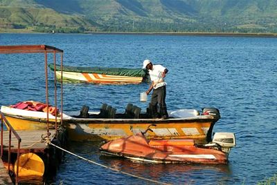 Men on boat in sea