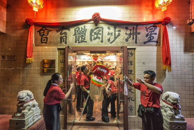 Group of people in front of building