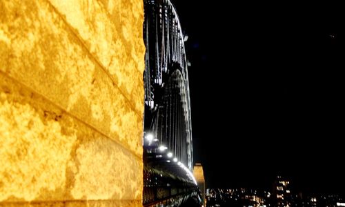 Low angle view of modern building at night