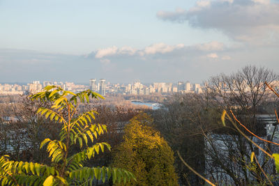 Panoramic view of city buildings against sky