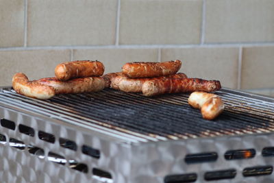 Close-up of meat on barbecue grill