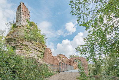 Low angle view of old building against sky