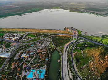 High angle view of road by river in city