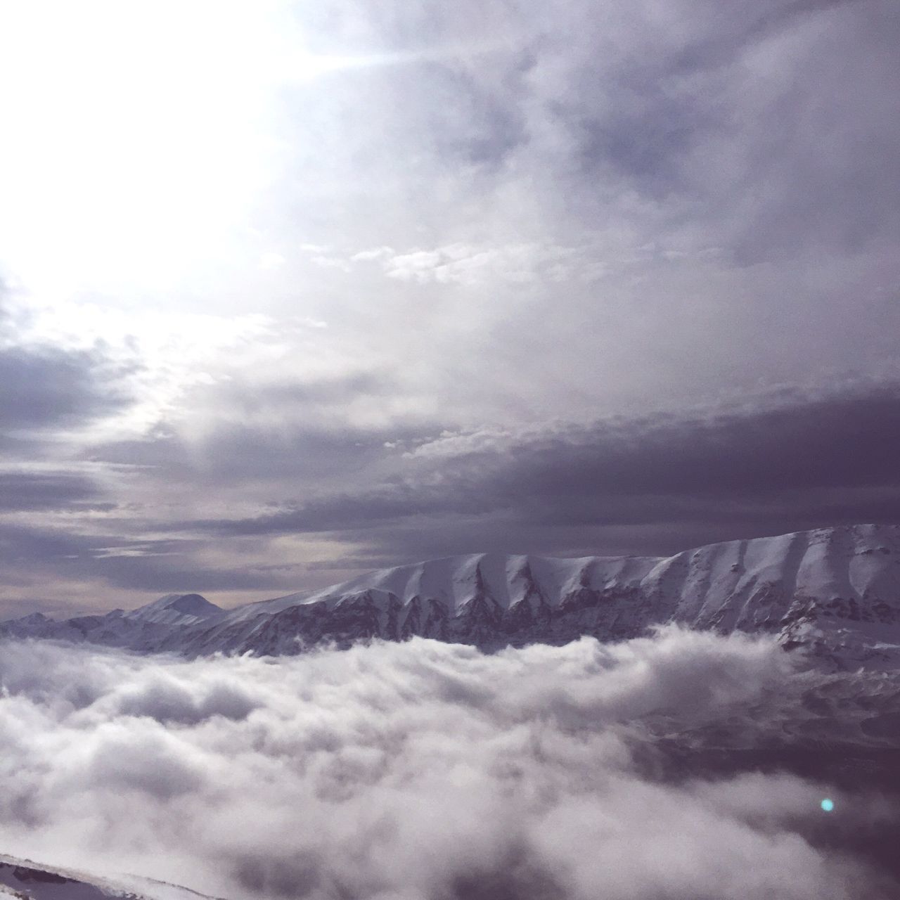 scenics, sky, beauty in nature, cloud - sky, tranquil scene, tranquility, nature, cloudy, weather, mountain, cloudscape, idyllic, cloud, majestic, low angle view, landscape, outdoors, non-urban scene, day, no people