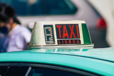 Close-up of taxi in city