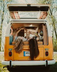 Rear view of people sitting in bus