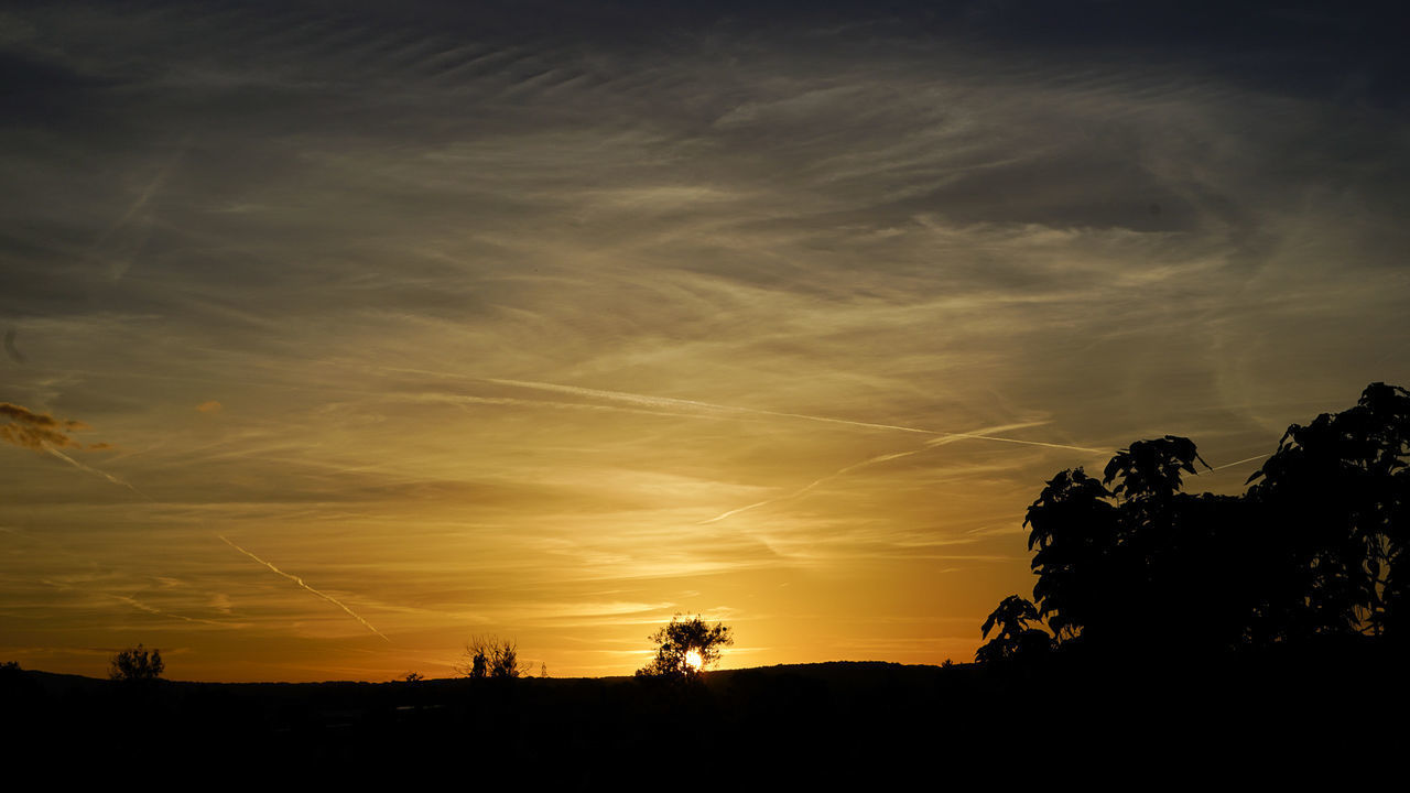 SILHOUETTE LANDSCAPE AGAINST SKY DURING SUNSET