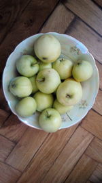 High angle view of apples in bowl on table