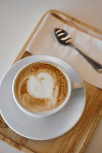 Close-up of cappuccino on table