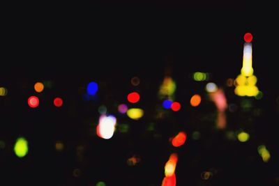 Defocused image of illuminated lights at night