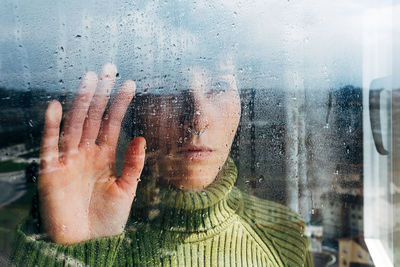 Portrait of wet glass window in rainy season