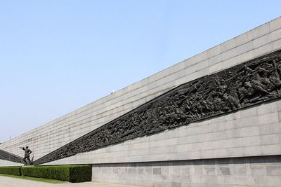 Low angle view of building against blue sky