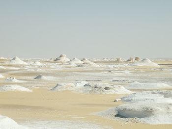 Scenic view of desert against clear sky