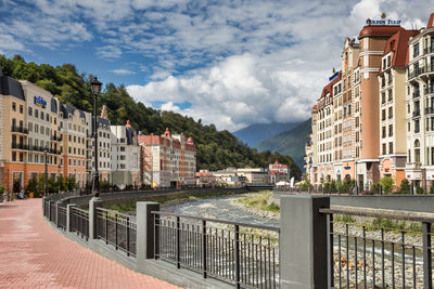 Buildings in city against sky