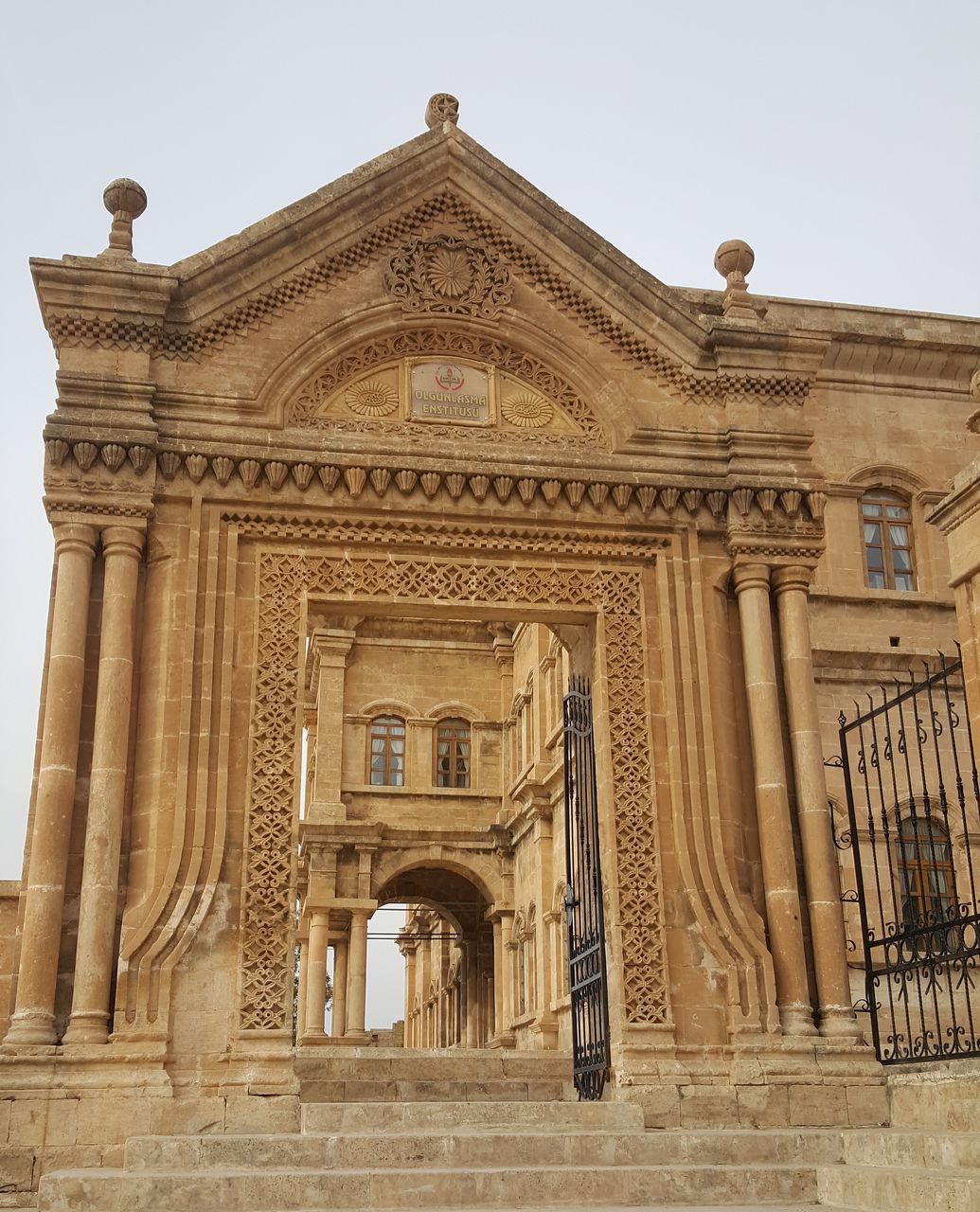 architecture, history, built structure, architectural column, tourism, ancient, low angle view, building exterior, travel destinations, day, outdoors, no people, sculpture, sky, ancient civilization