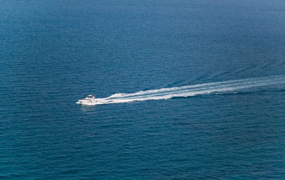 Boat sailing in sea