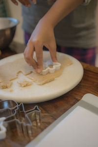 Midsection of person preparing food