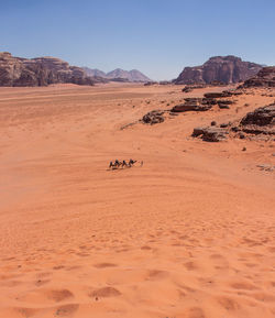 Scenic view of desert against clear sky