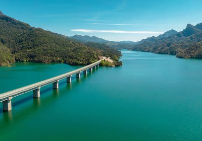 Scenic view of lake against blue sky