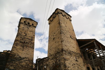 Low angle view of old building against sky