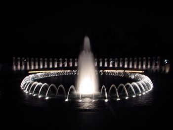 Reflection of illuminated buildings in water