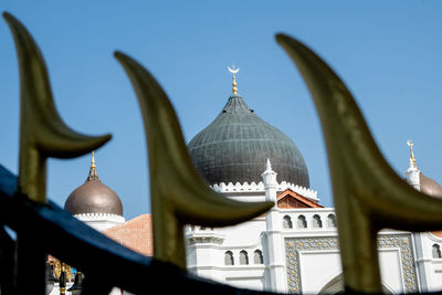 Low angle view of traditional building against clear sky