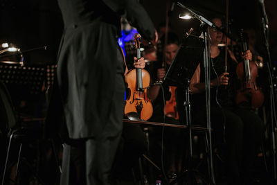 People playing piano at music concert