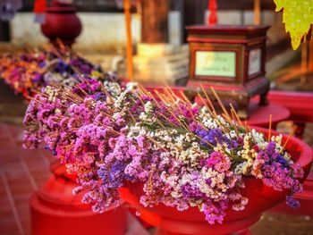 Close-up of purple flower pot for sale