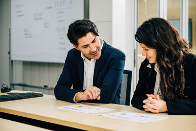 Business colleagues working in office