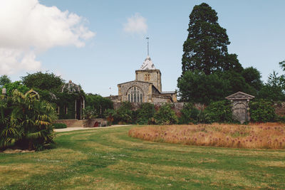 Built structure with trees in foreground