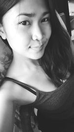 Portrait of a smiling young woman