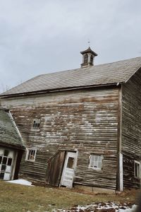 Low angle view of old building against sky