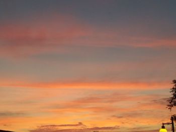 Low angle view of dramatic sky during sunset