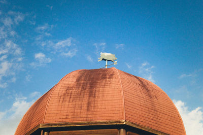 Low angle view of water tower against sky