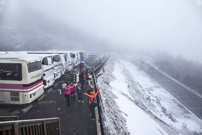 High angle view of tourists at mt fuji