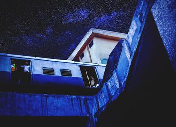 Low angle view of building against blue sky
