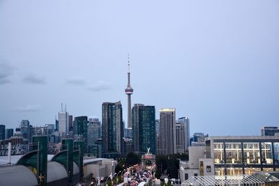 Modern buildings in city against sky