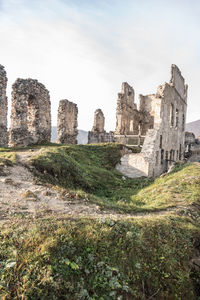 Old ruins of building against sky