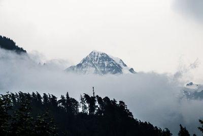 Snowy black mountain top 