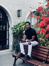 Portrait of woman sitting on street