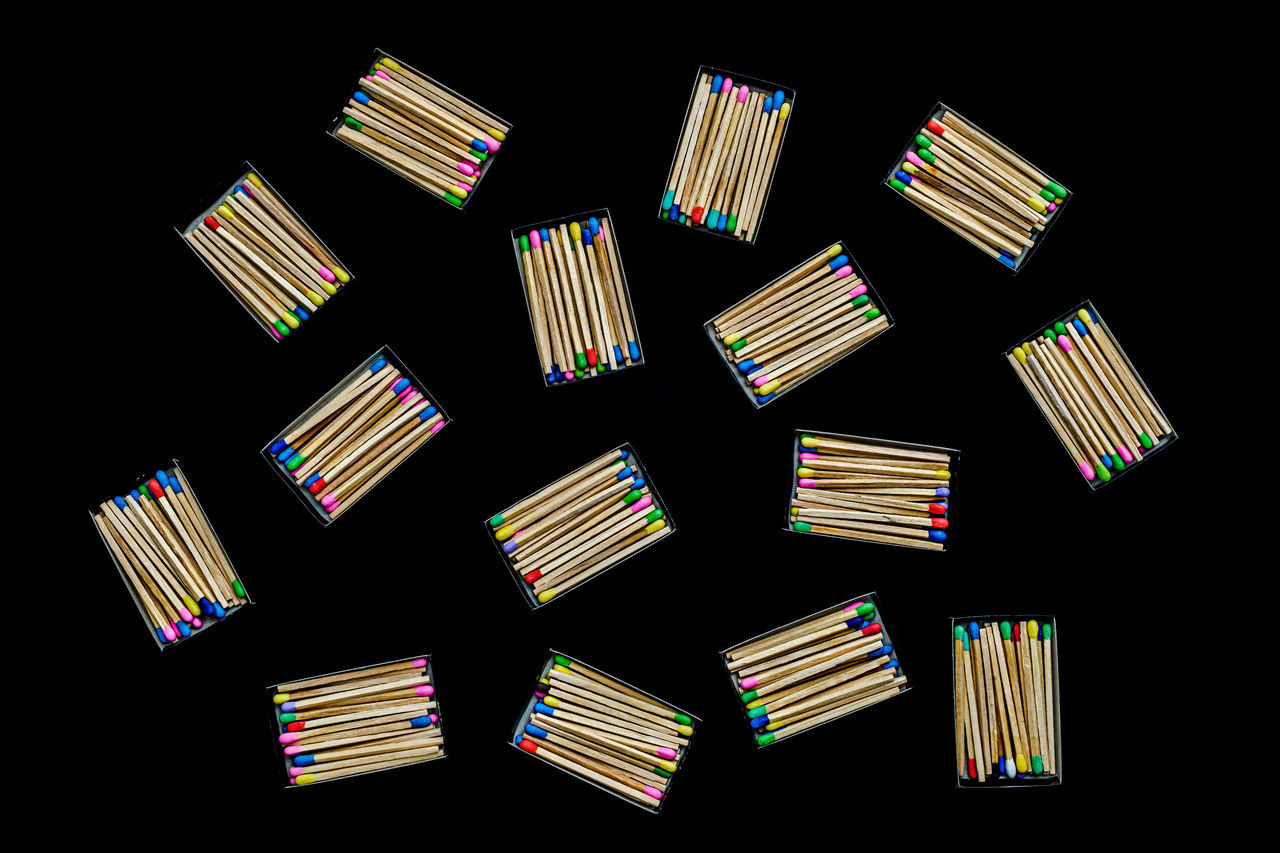 HIGH ANGLE VIEW OF MULTI COLORED PENCILS IN OFFICE